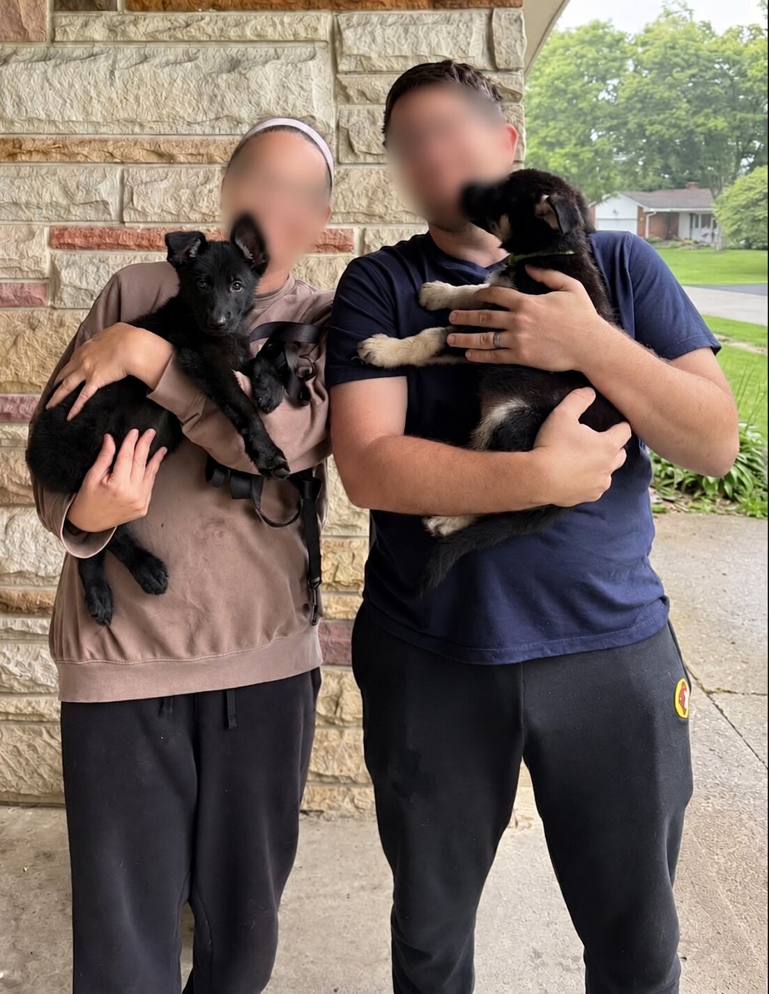 Gwen with their family; family members' faces are blurred for privacy